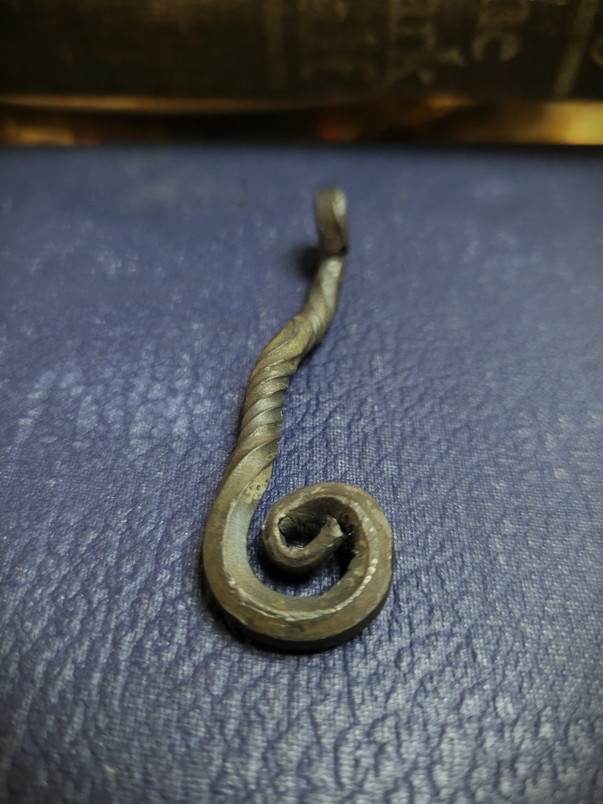 A handmade piece of jewelry styles as an alchemy talisman