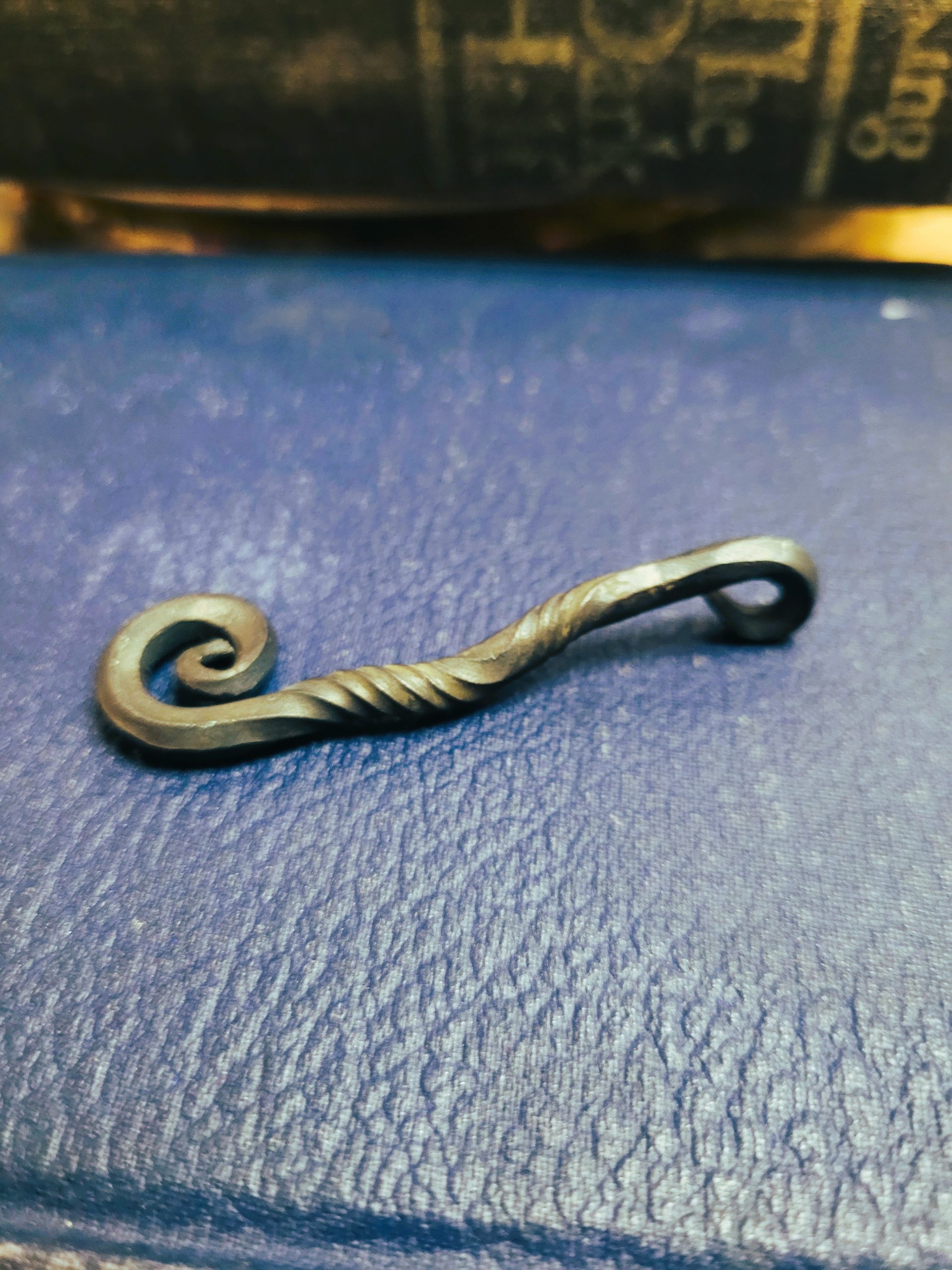 A handmade piece of jewelry styles as an alchemy talisman