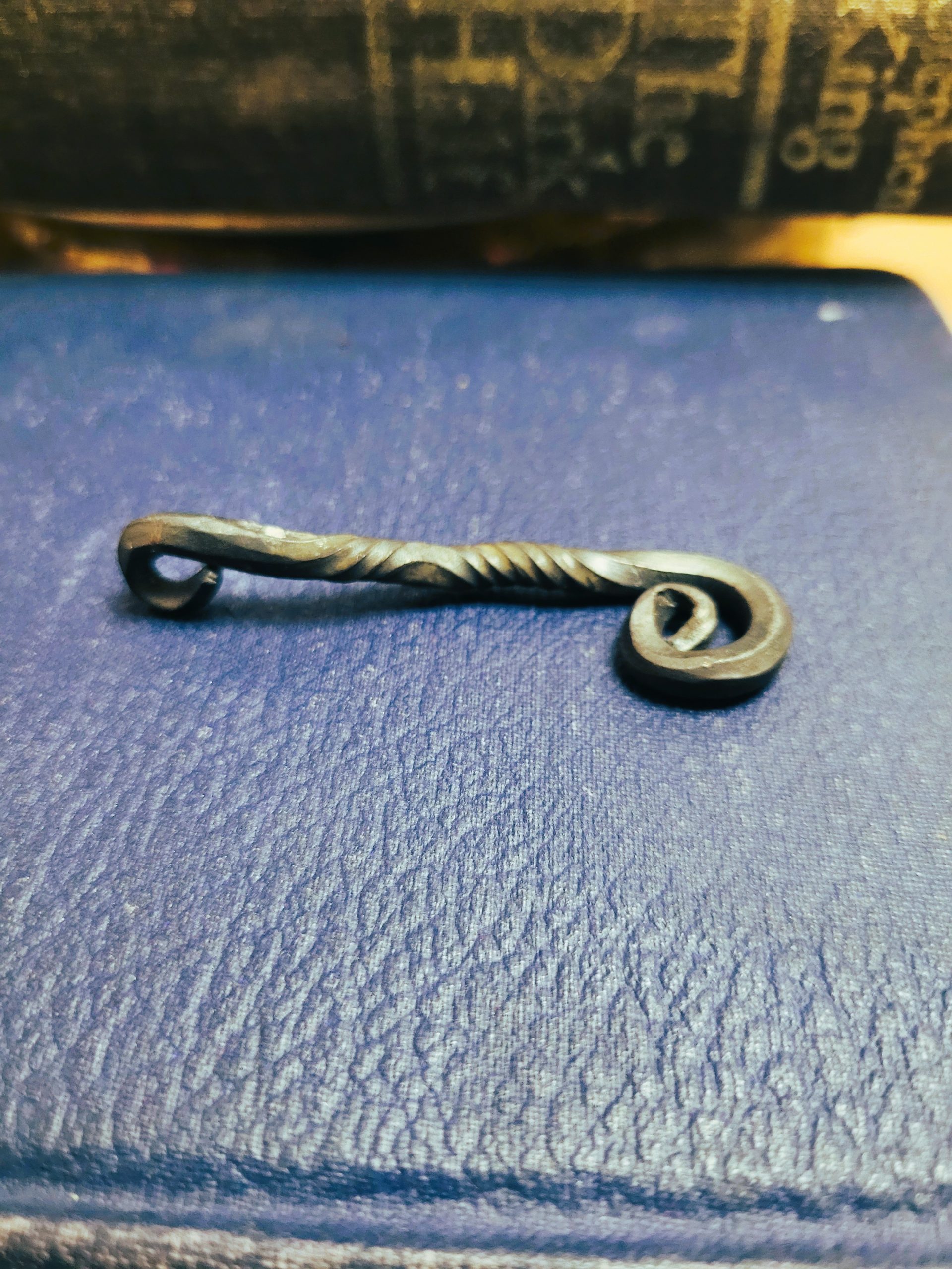 A handmade piece of jewelry styles as an alchemy talisman