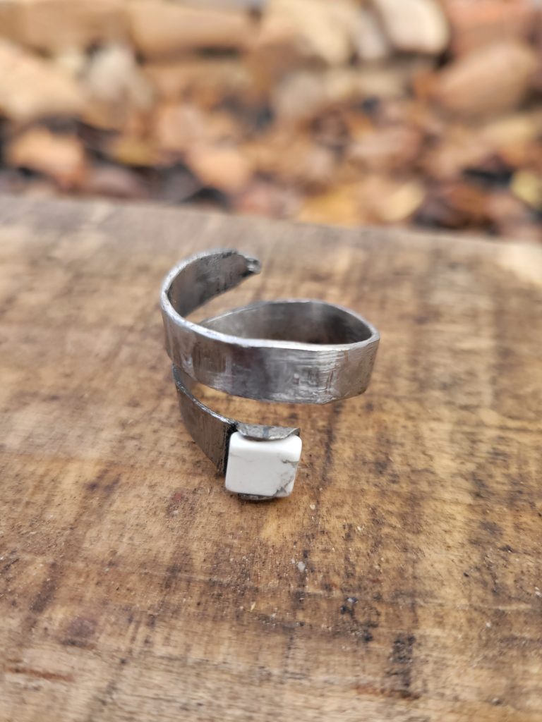 A spiral hand part of our handcrafted jewelry collection. It was hand forged from an old allan wrench